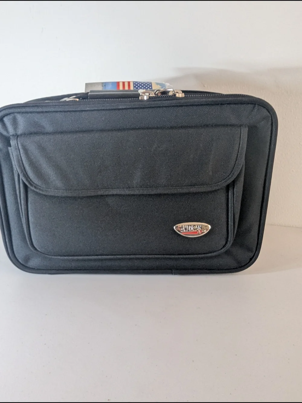 New with tags American Uni travel laptop and document organizer bag in black.